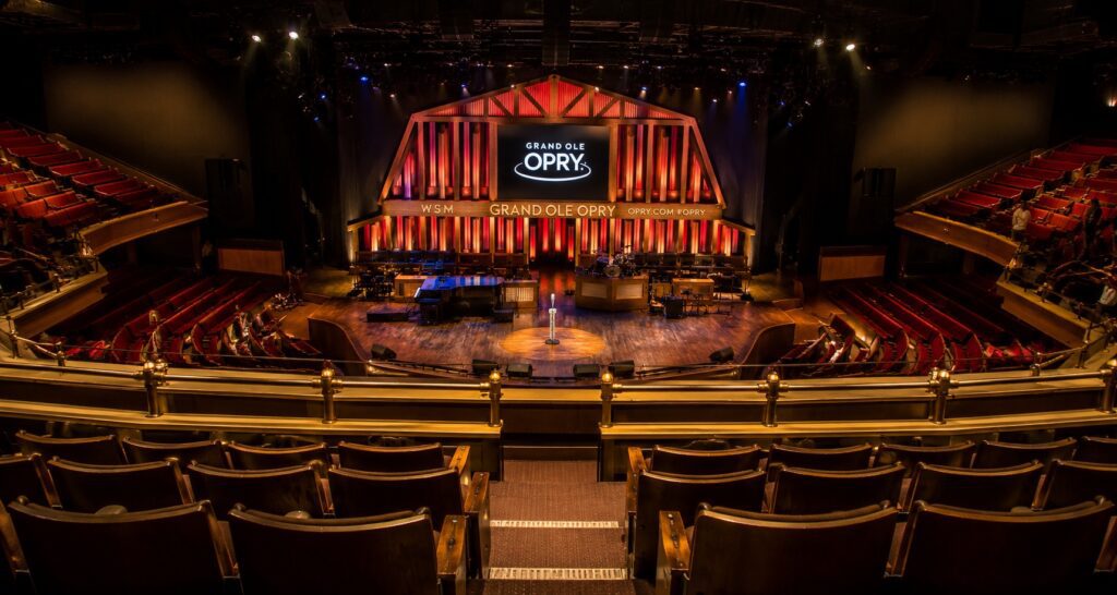 Best Seats at Grand Ole Opry House inside the Grand Ole Opry House in Nashville with a view of the famous stage.